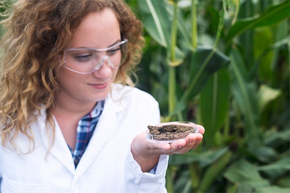 female-agronomist-specialist-examining-soil-sample-fertility-potential